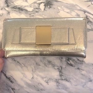 Silver wallet with bow accent